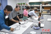 解梦官网两岸艺术家在安徽“共绘一幅画”